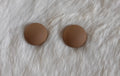 Round light brown Cabs